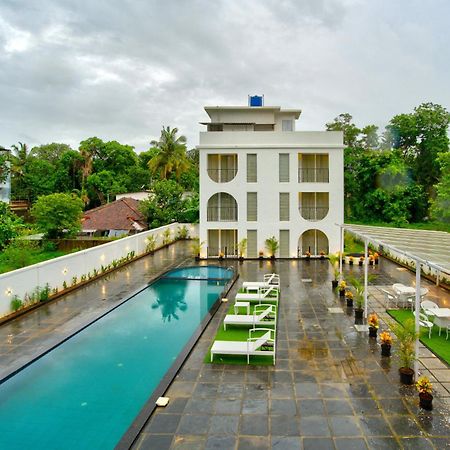 Goa Courtyard By The Porto Arpora Hotel Baga Bagian luar foto