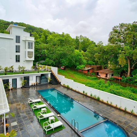 Goa Courtyard By The Porto Arpora Hotel Baga Bagian luar foto