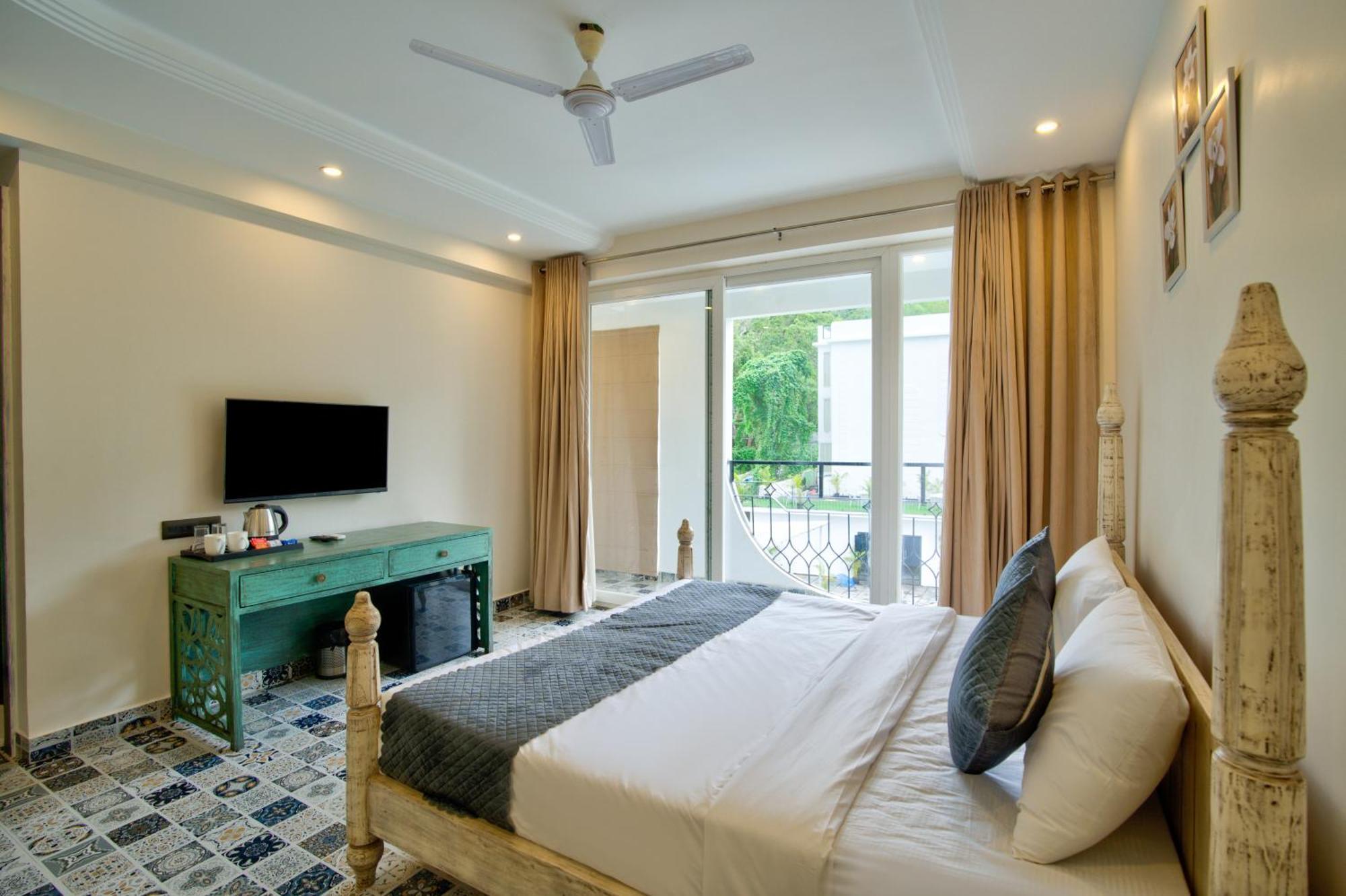 Goa Courtyard By The Porto Arpora Hotel Baga Bagian luar foto