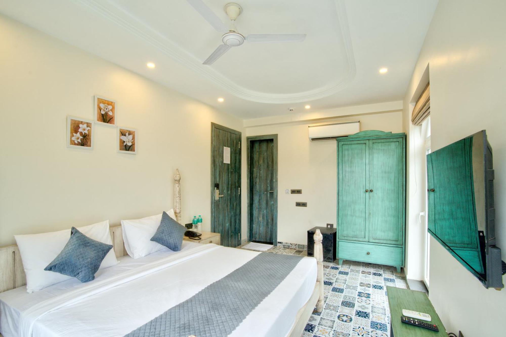 Goa Courtyard By The Porto Arpora Hotel Baga Bagian luar foto