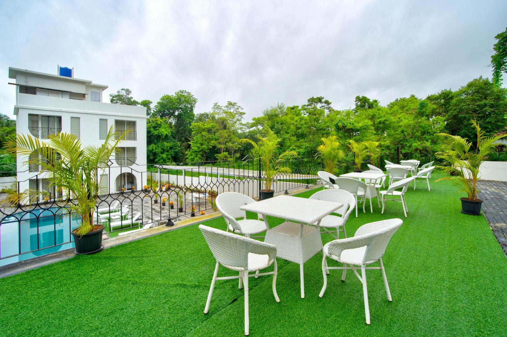 Goa Courtyard By The Porto Arpora Hotel Baga Bagian luar foto