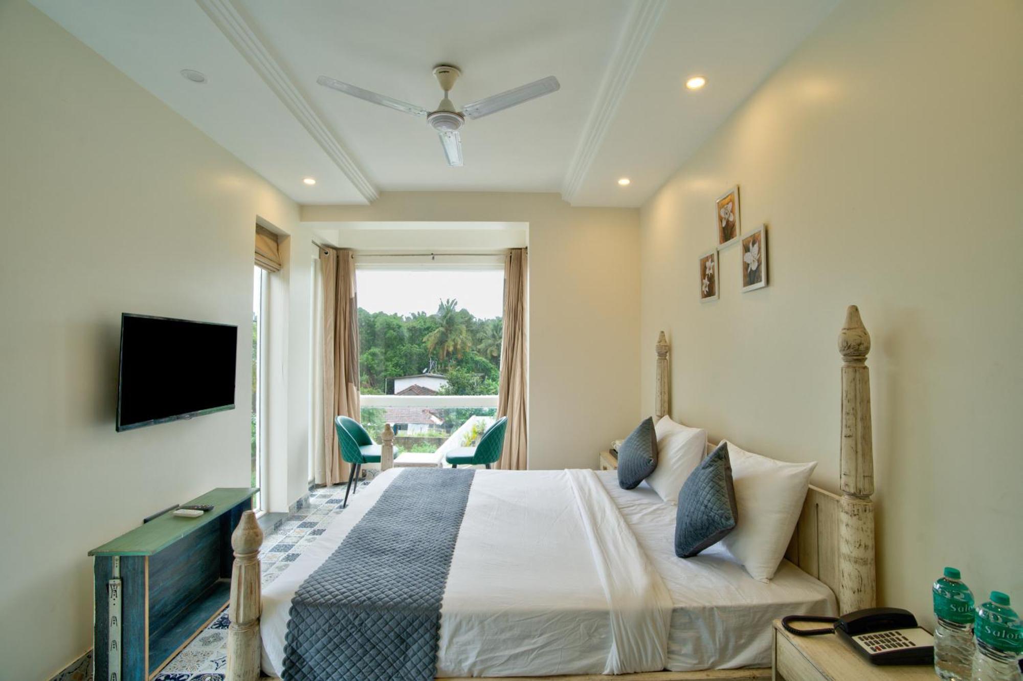 Goa Courtyard By The Porto Arpora Hotel Baga Bagian luar foto