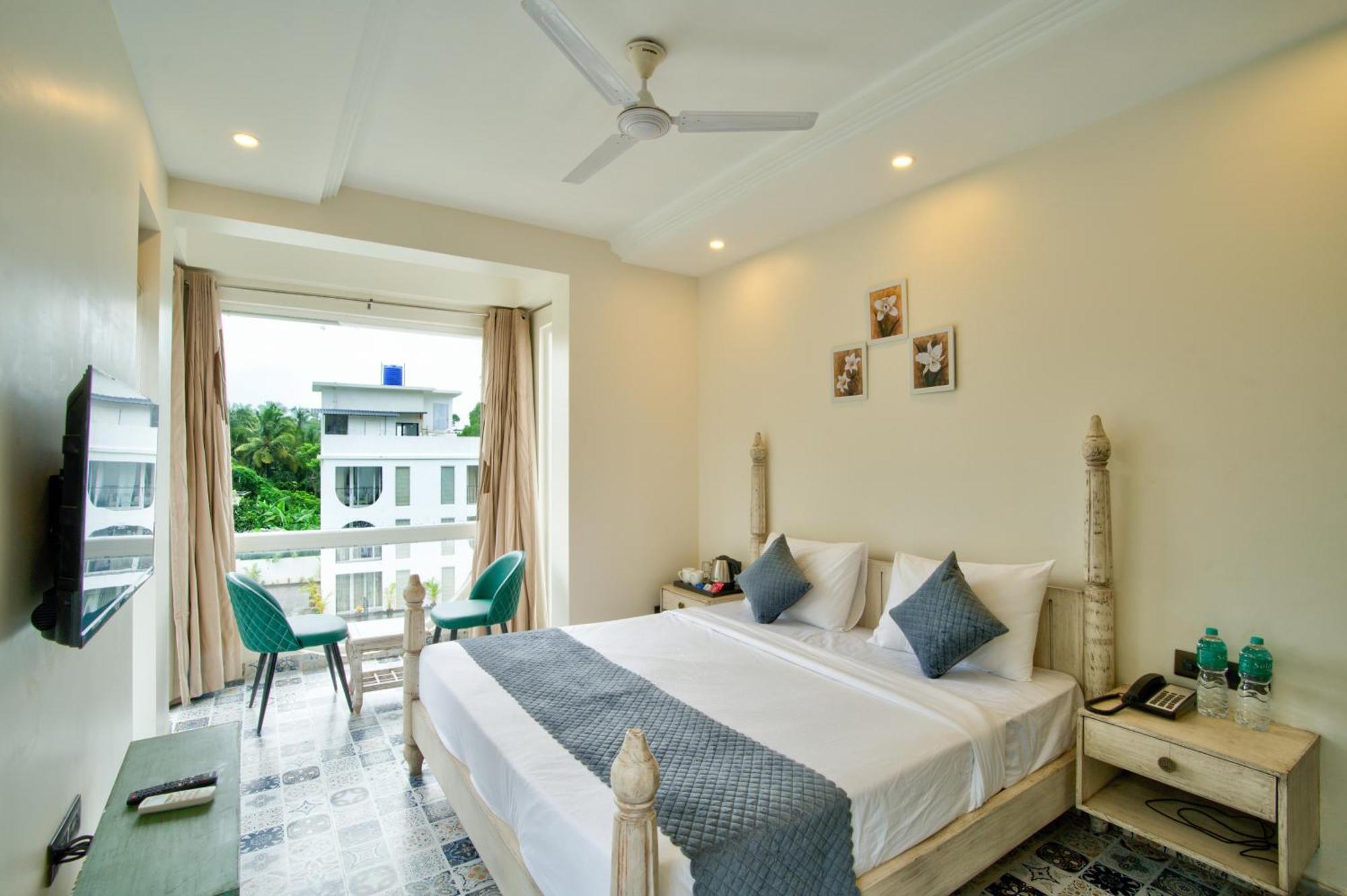 Goa Courtyard By The Porto Arpora Hotel Baga Bagian luar foto