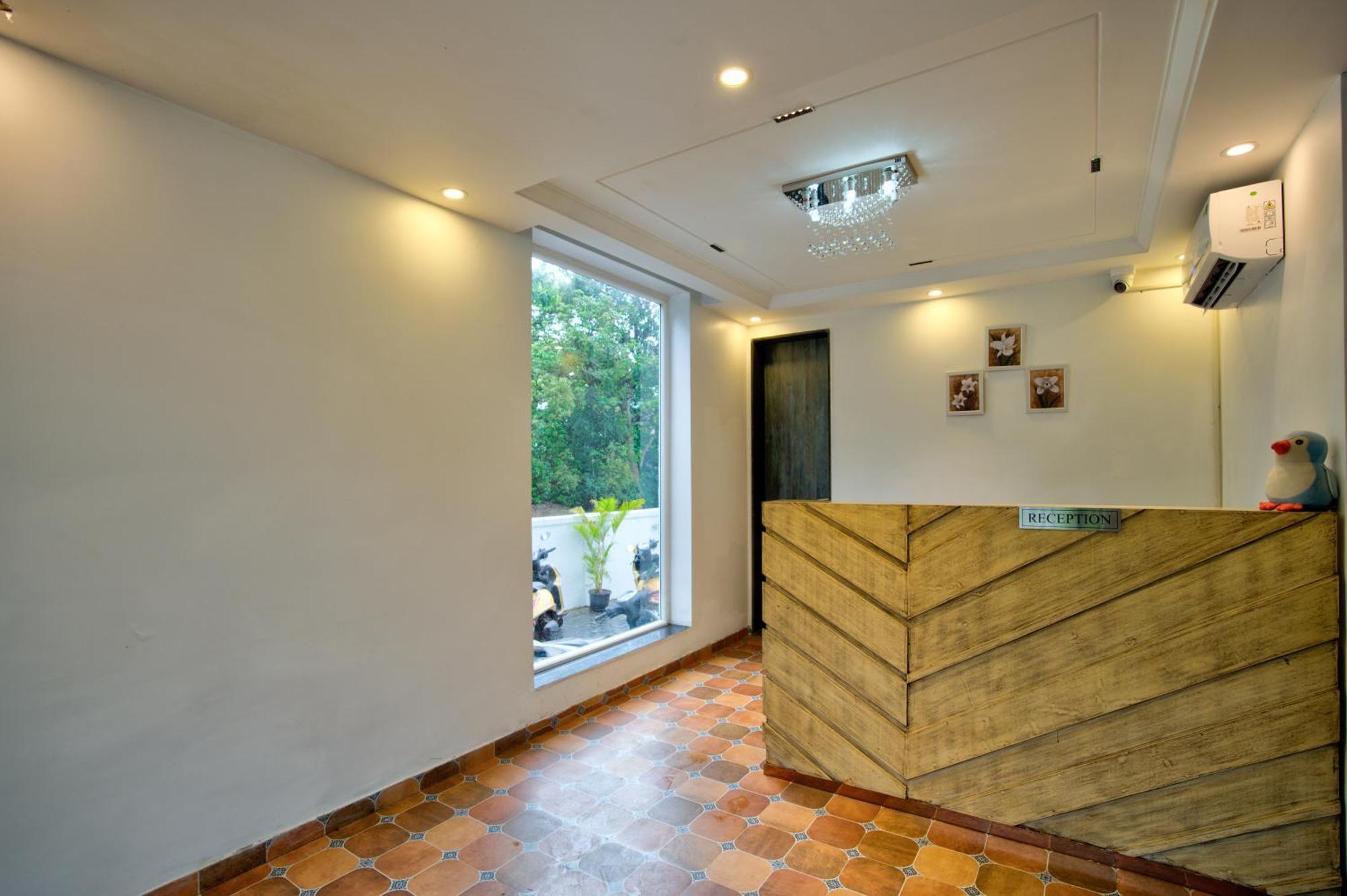 Goa Courtyard By The Porto Arpora Hotel Baga Bagian luar foto