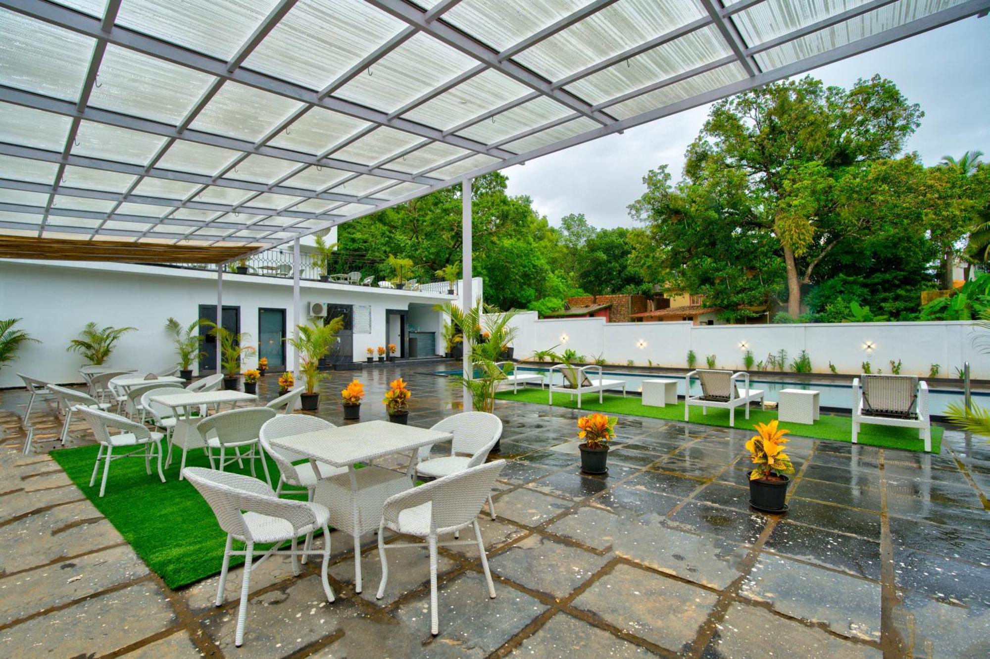 Goa Courtyard By The Porto Arpora Hotel Baga Bagian luar foto