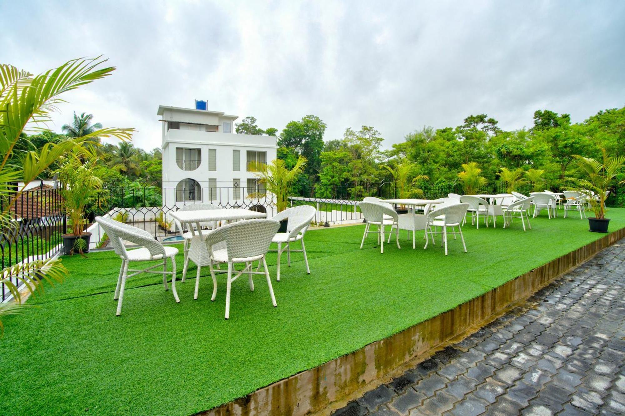 Goa Courtyard By The Porto Arpora Hotel Baga Bagian luar foto