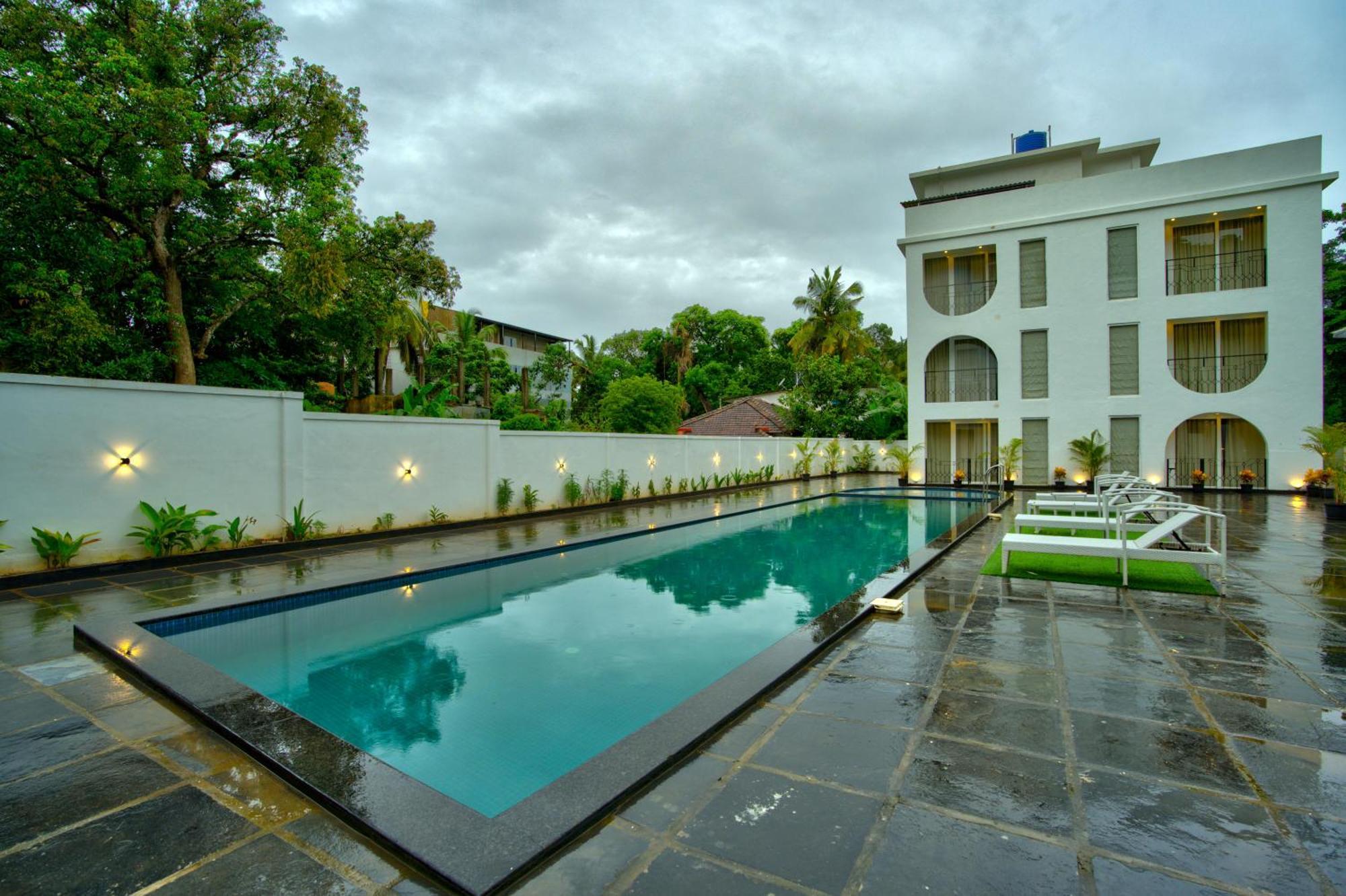 Goa Courtyard By The Porto Arpora Hotel Baga Bagian luar foto