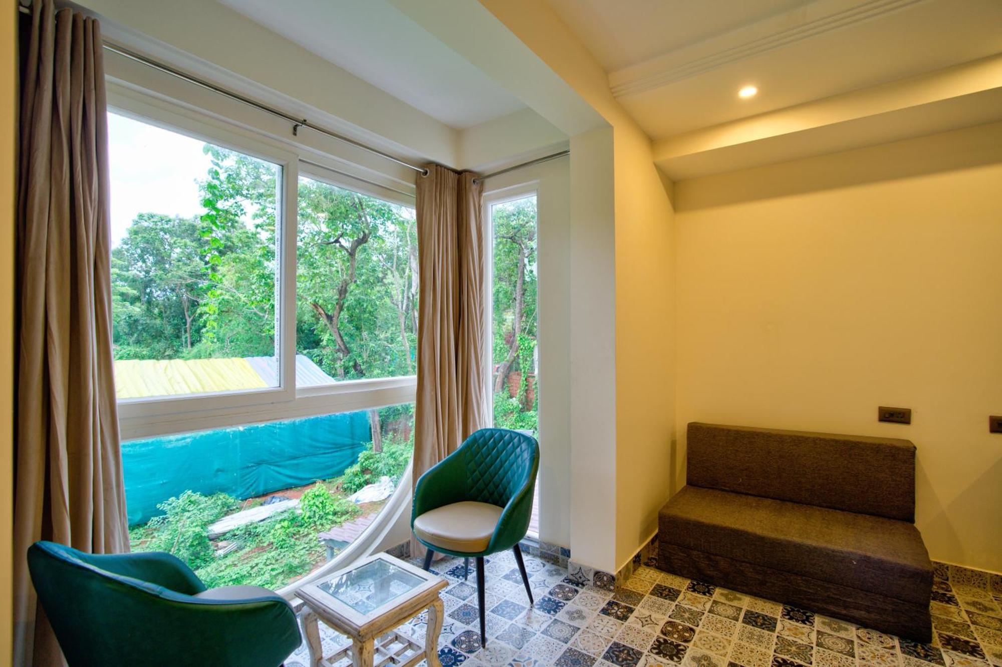 Goa Courtyard By The Porto Arpora Hotel Baga Bagian luar foto