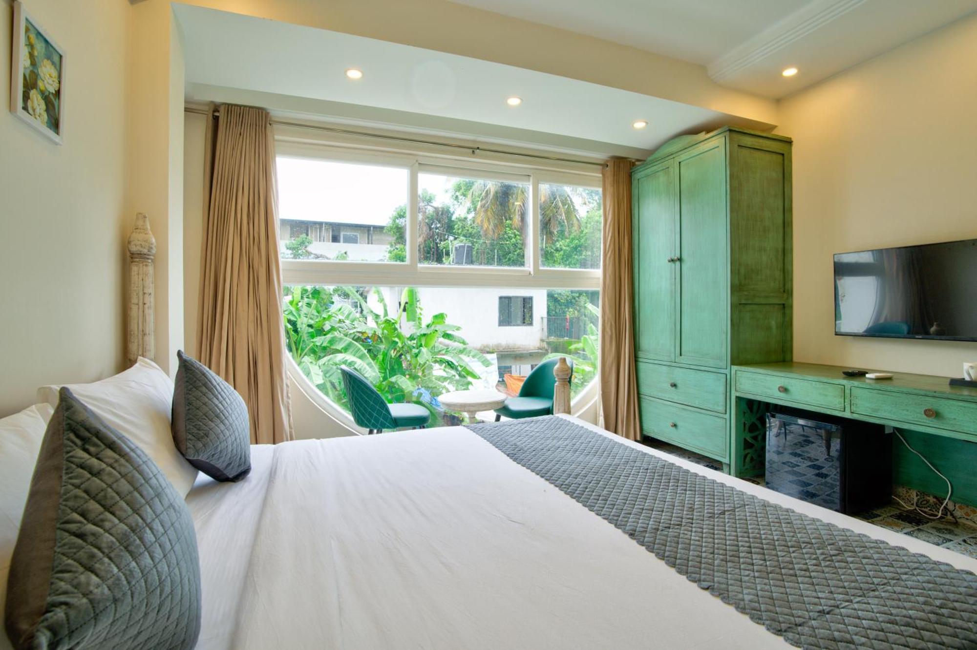 Goa Courtyard By The Porto Arpora Hotel Baga Bagian luar foto
