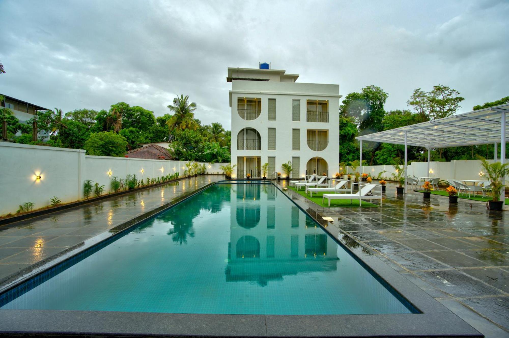 Goa Courtyard By The Porto Arpora Hotel Baga Bagian luar foto