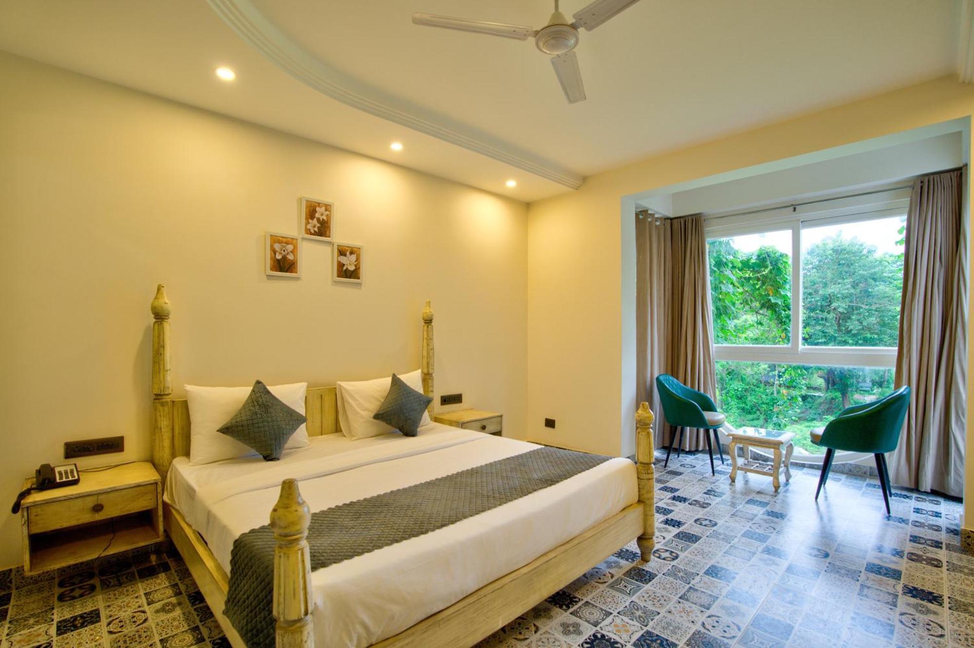 Goa Courtyard By The Porto Arpora Hotel Baga Bagian luar foto