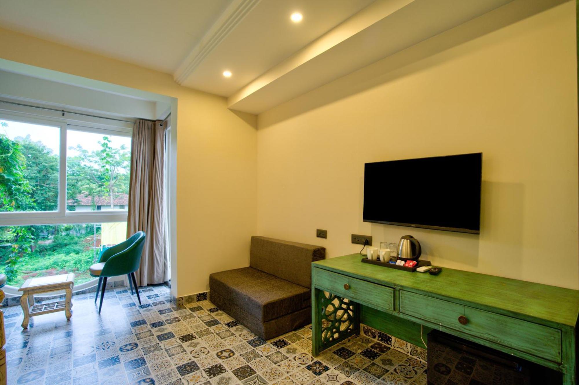 Goa Courtyard By The Porto Arpora Hotel Baga Bagian luar foto