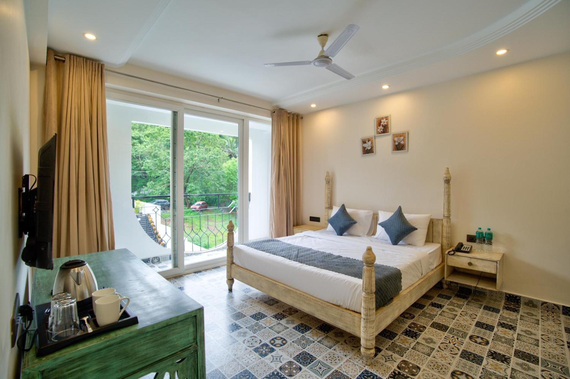 Goa Courtyard By The Porto Arpora Hotel Baga Bagian luar foto